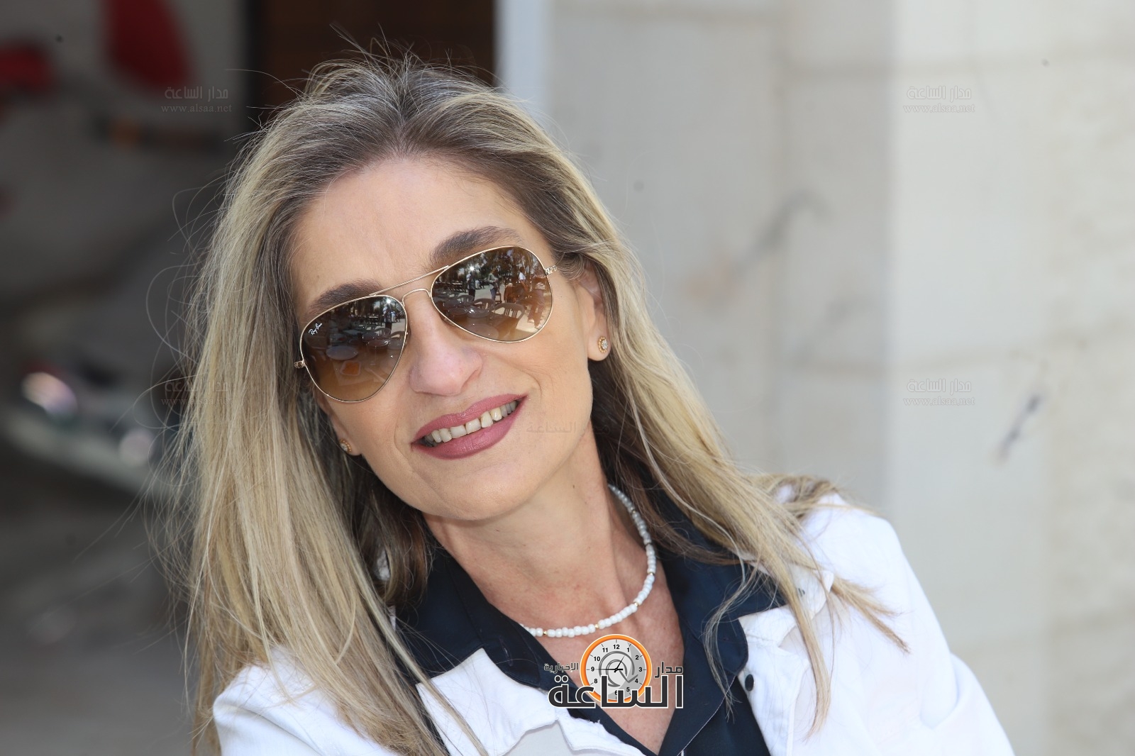 Madar Al-Saa Images 0.793332430777445