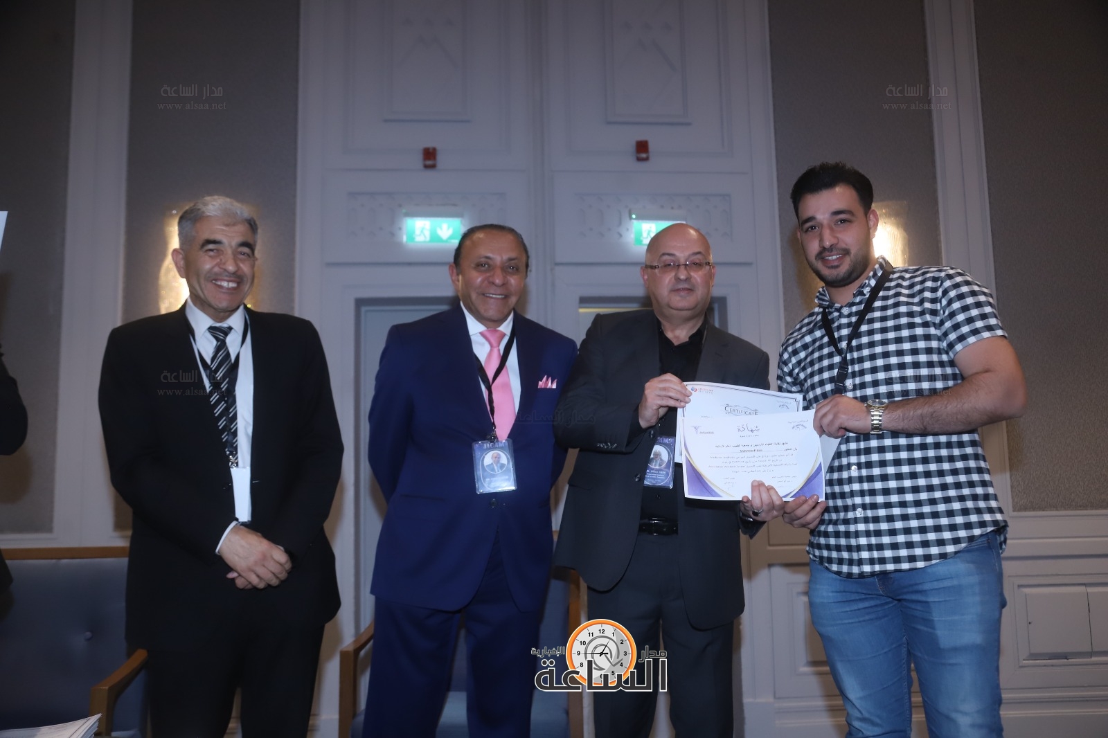 Madar Al-Saa Images 0.2923534483060035