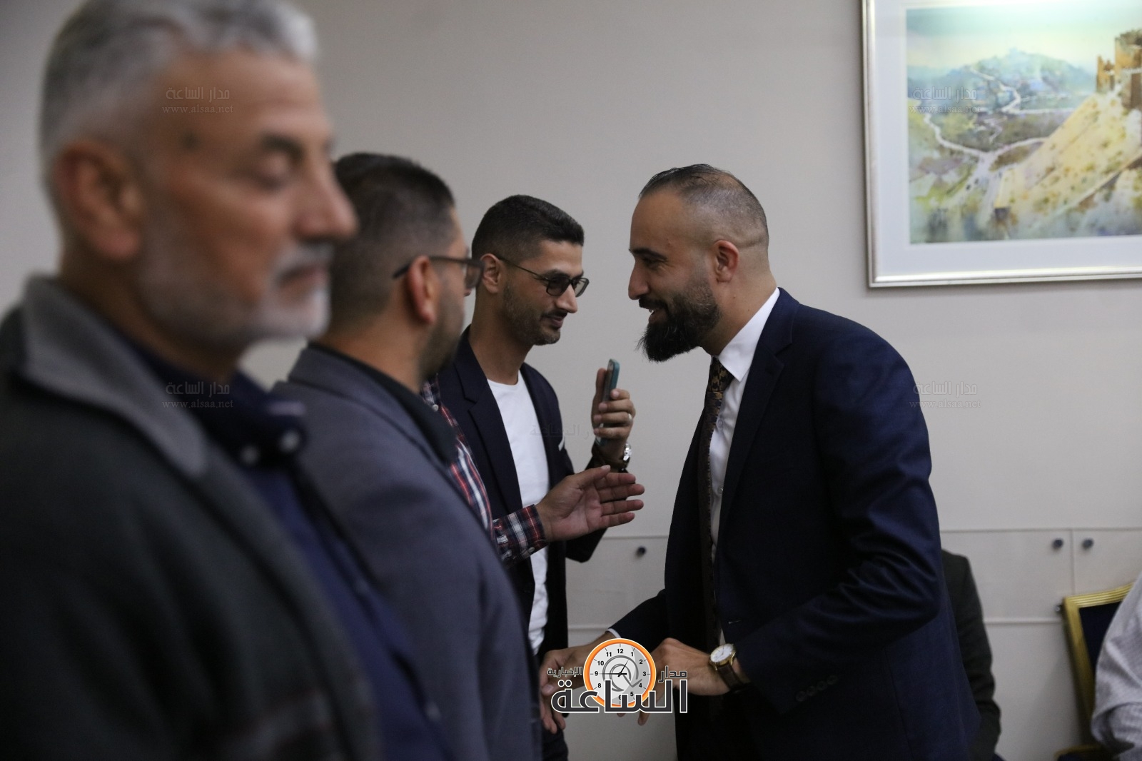 Madar Al-Saa Images 0.6938972558240638