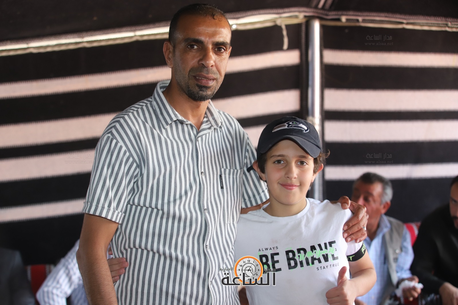 Madar Al-Saa Images 0.0007732372525248721