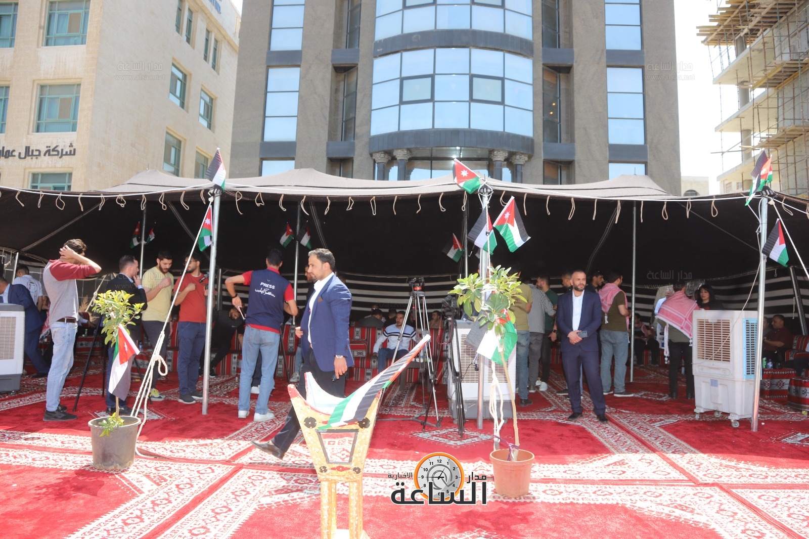 Madar Al-Saa Images 0.38144788185713807