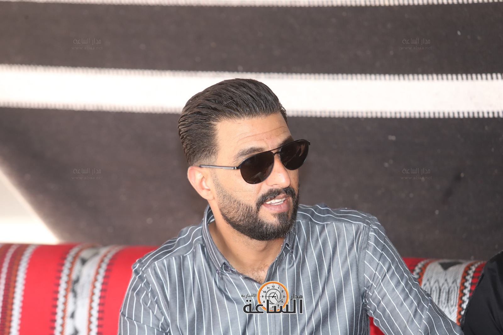 Madar Al-Saa Images 0.5965473877647072