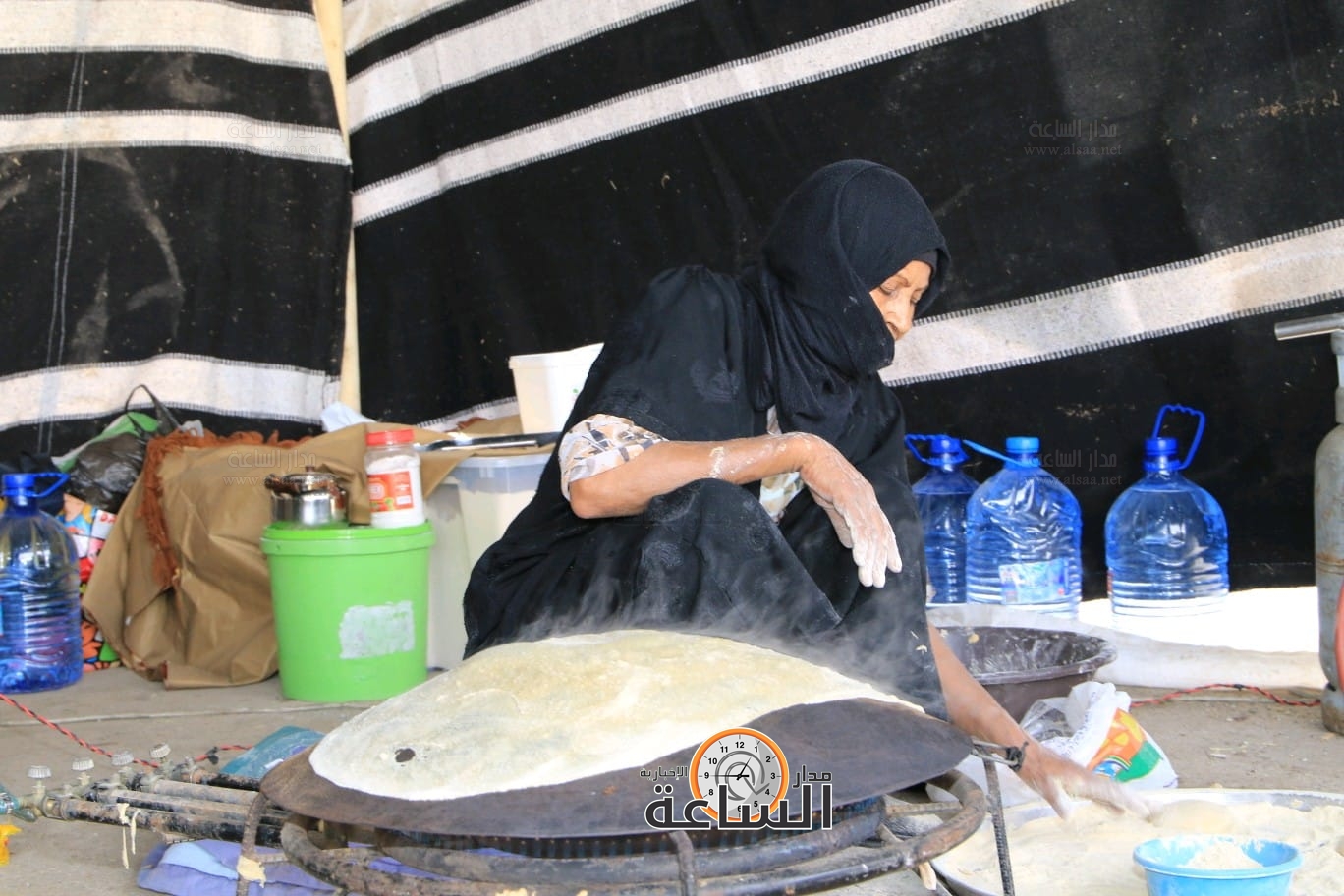 Madar Al-Saa Images 0.9050377229989728