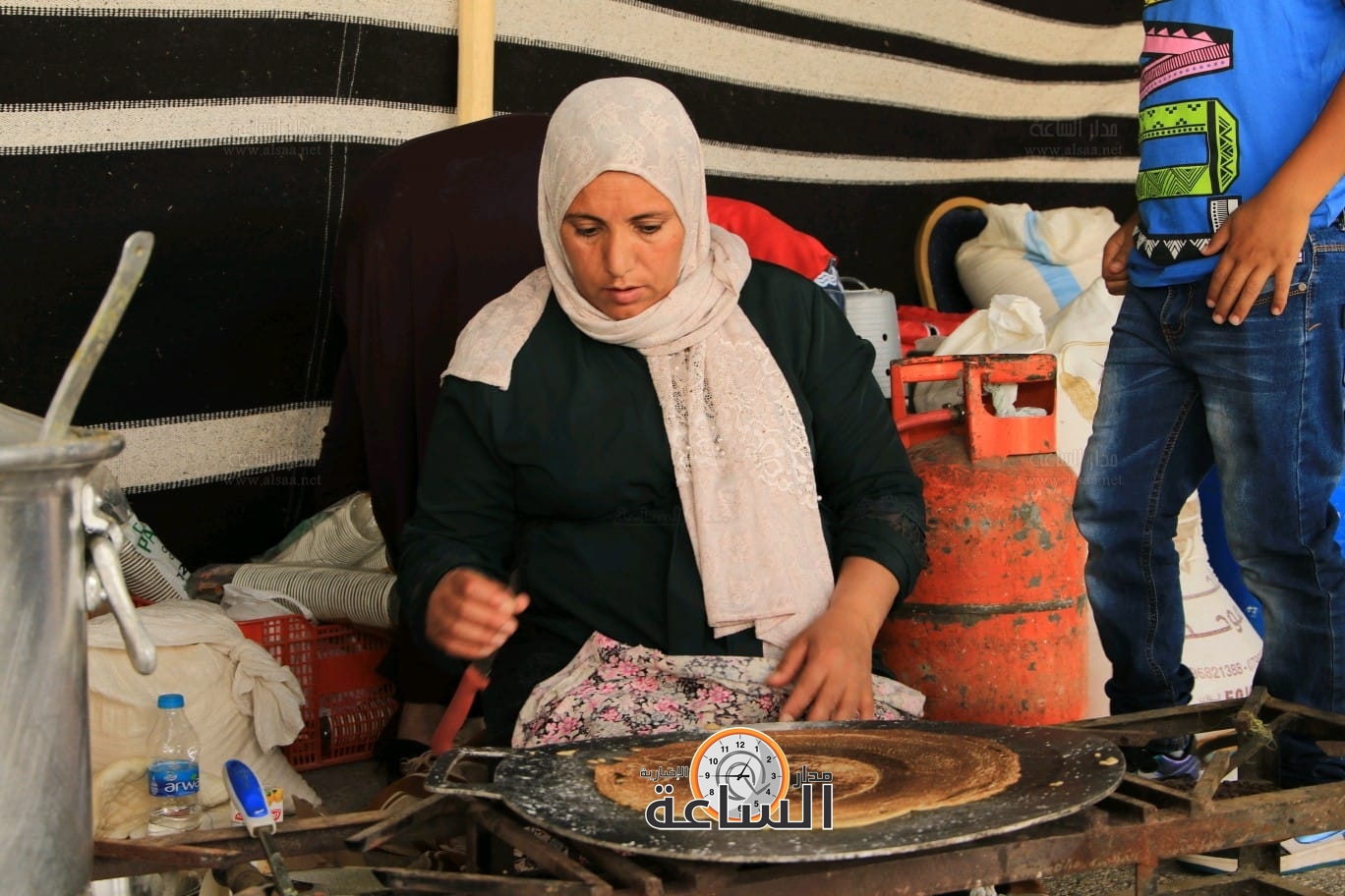 Madar Al-Saa Images 0.12688903355676828