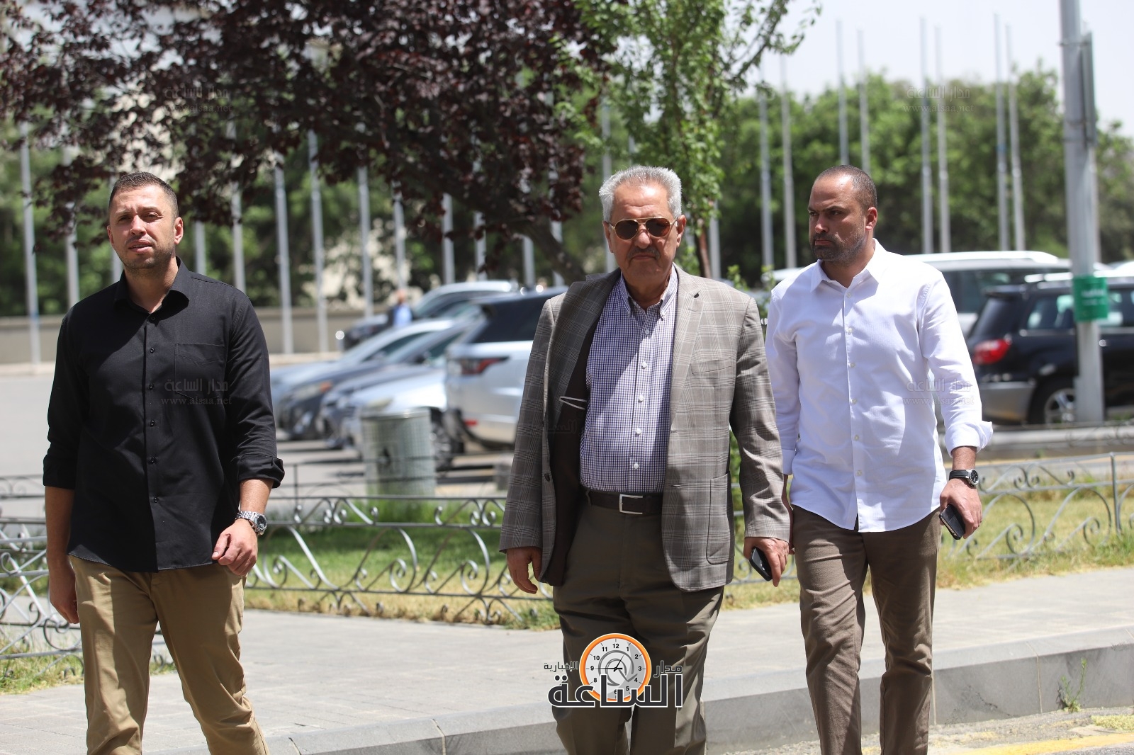 Madar Al-Saa Images 0.7122159673079433