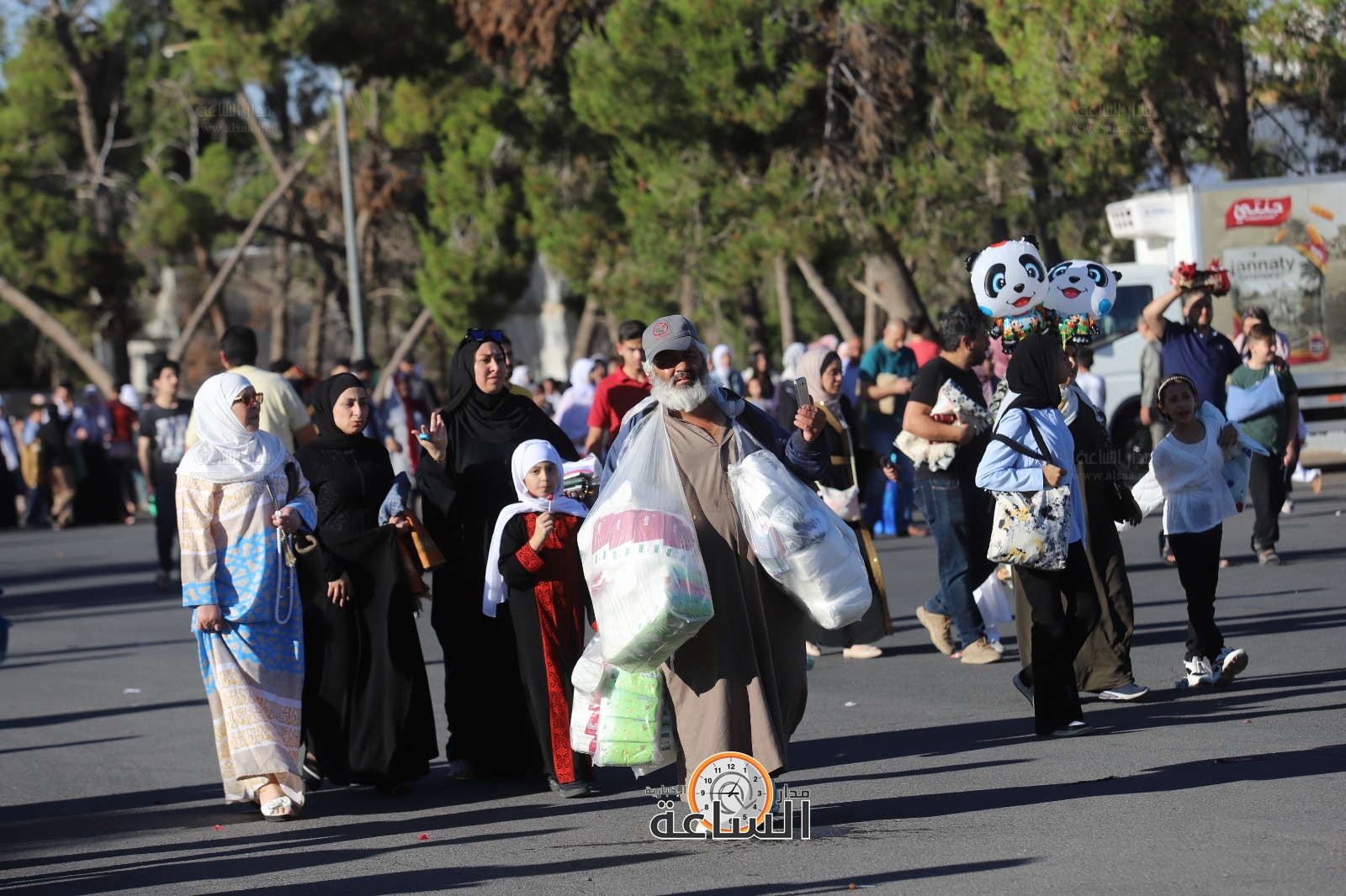 Madar Al-Saa Images 0.7119552041810305