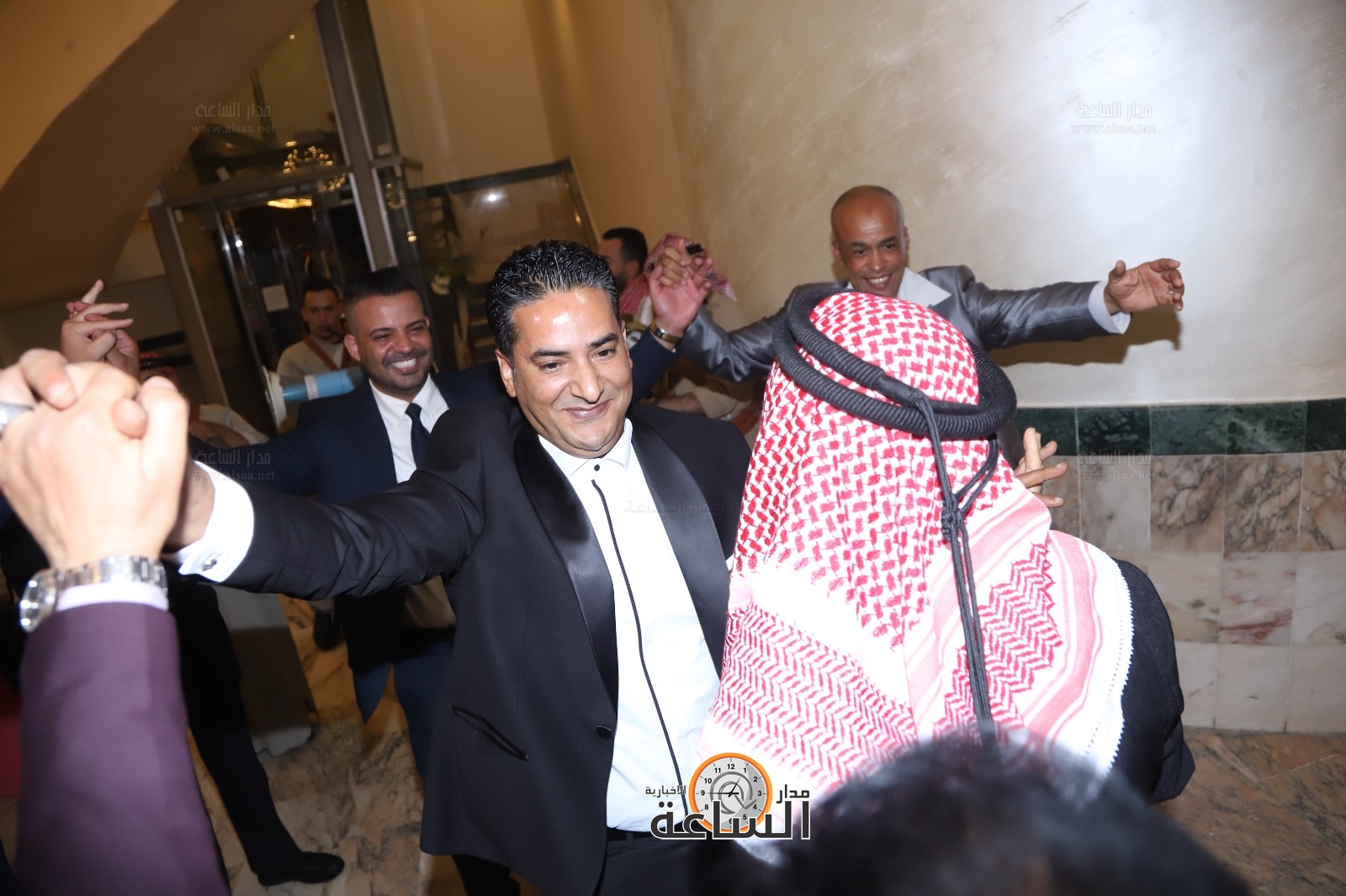 Madar Al-Saa Images 0.8002059023979912