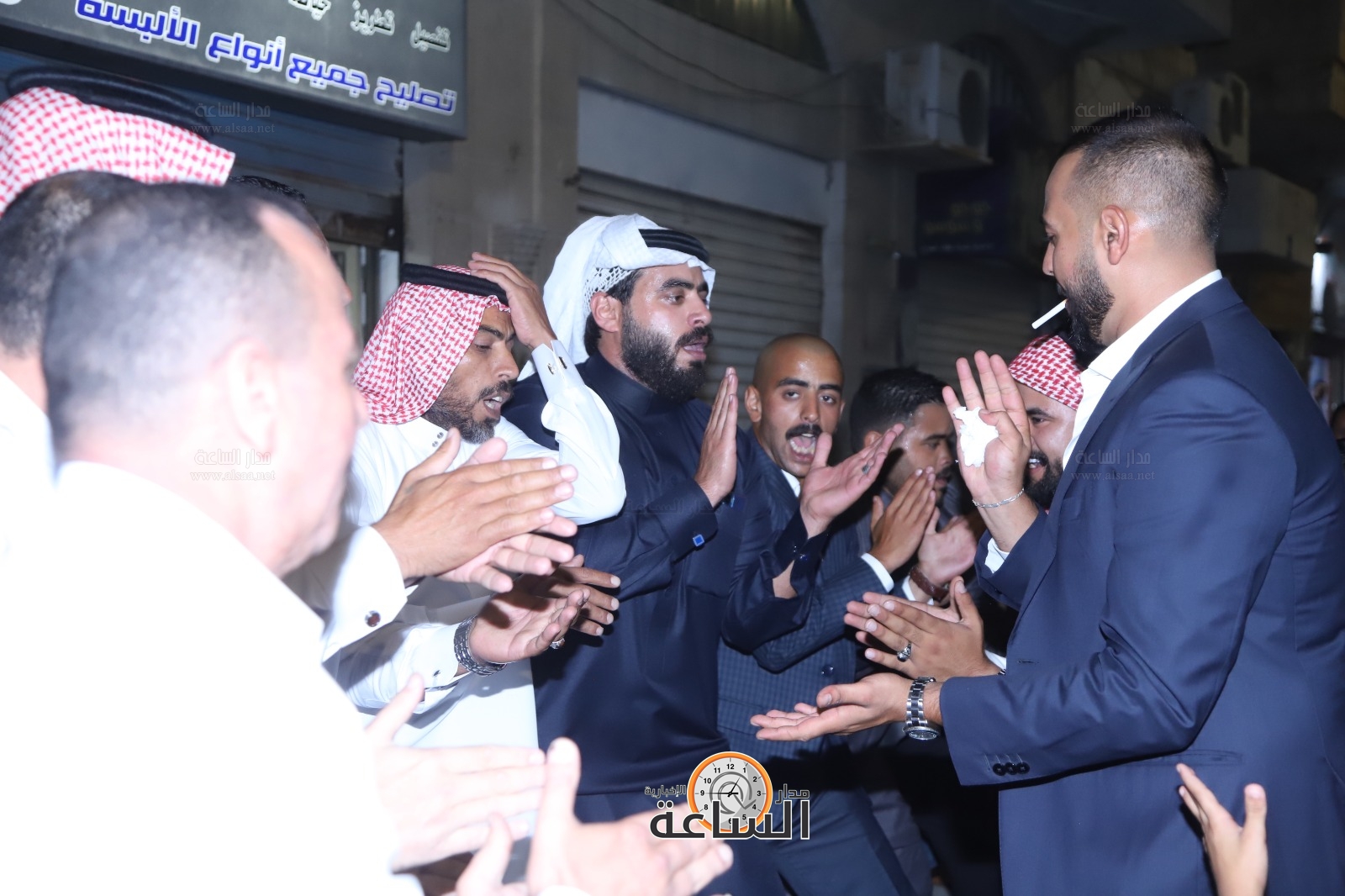 Madar Al-Saa Images 0.6931625913501425