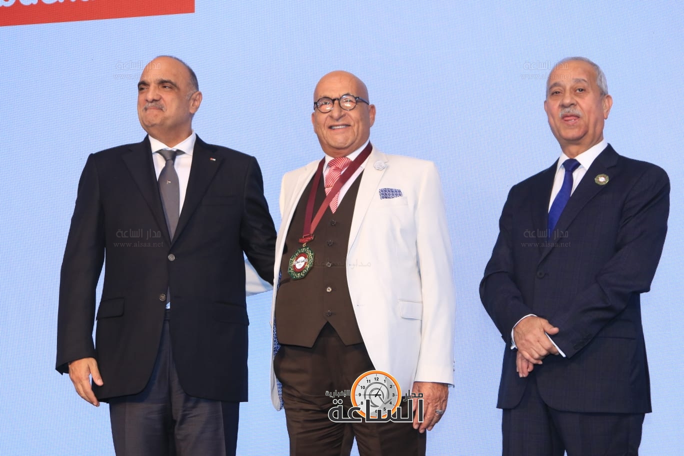 Madar Al-Saa Images 0.1289078994273376