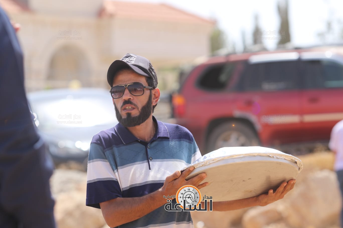 Madar Al-Saa Images 0.7443659177826736