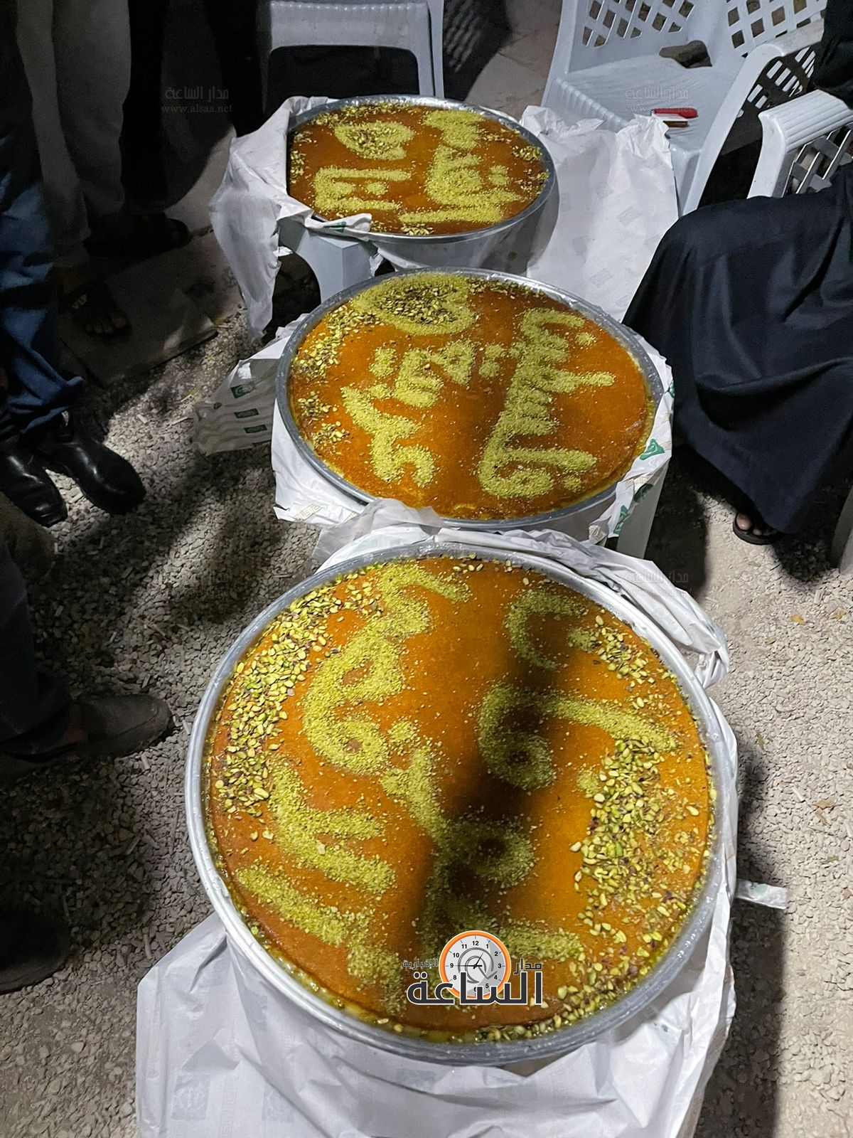 Madar Al-Saa Images 0.37833504001167473