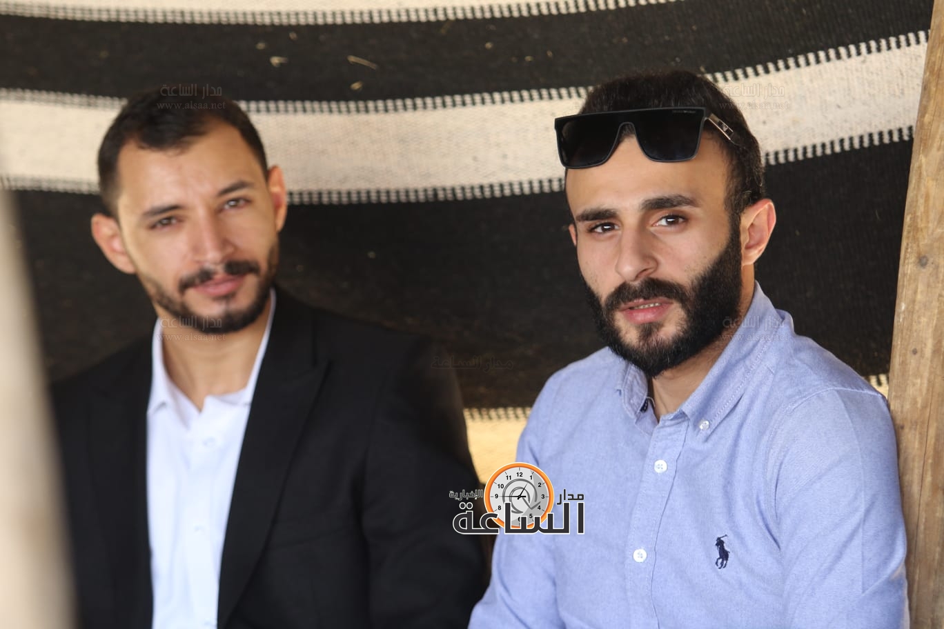 Madar Al-Saa Images 0.01233234281336304