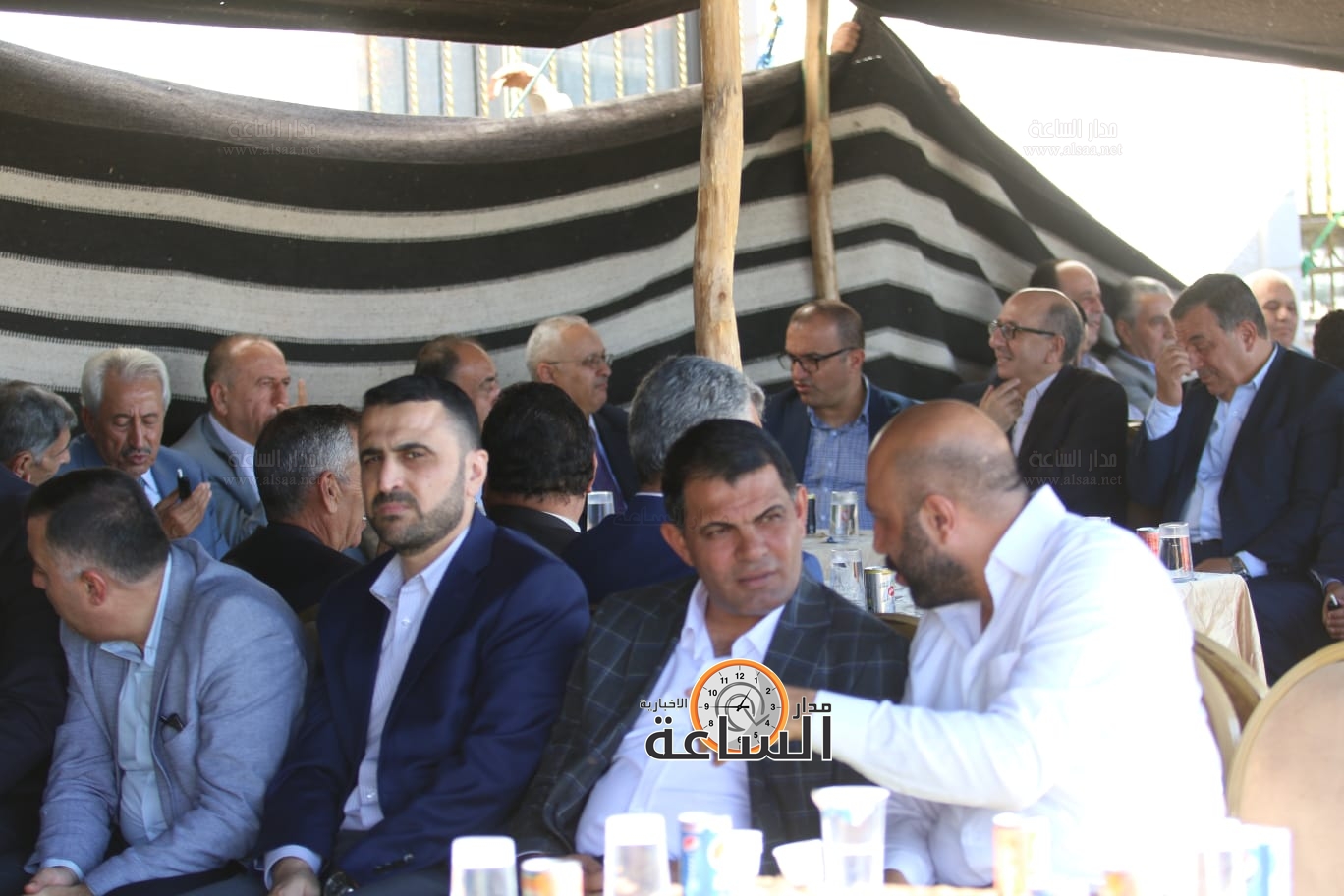 Madar Al-Saa Images 0.7604054437777124