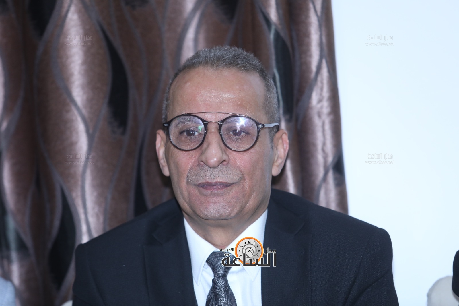 Madar Al-Saa Images 0.8177667862791866