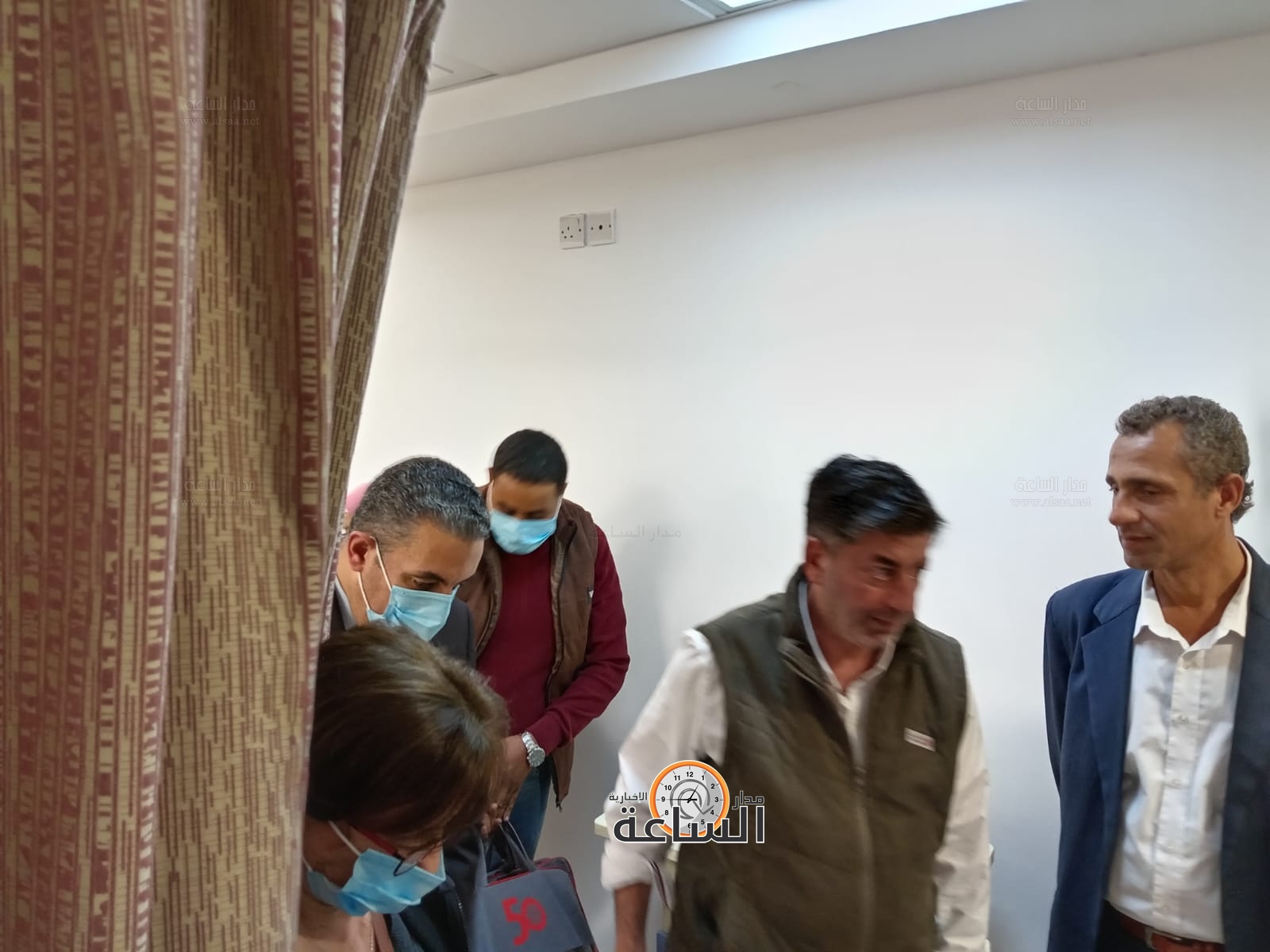 Madar Al-Saa Images 0.9354564449725644