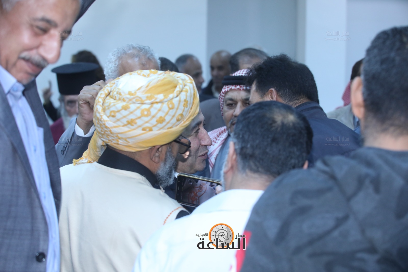 Madar Al-Saa Images 0.9948088469002208