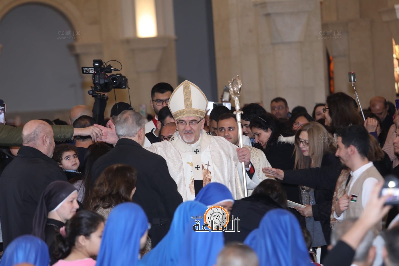 Madar Al-Saa Images 0.8399237497189611