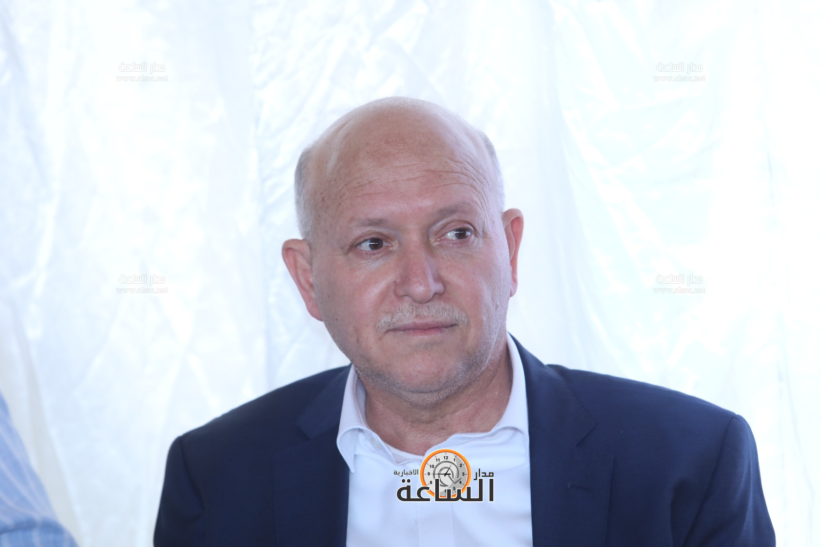 Madar Al-Saa Images 0.888486390306316