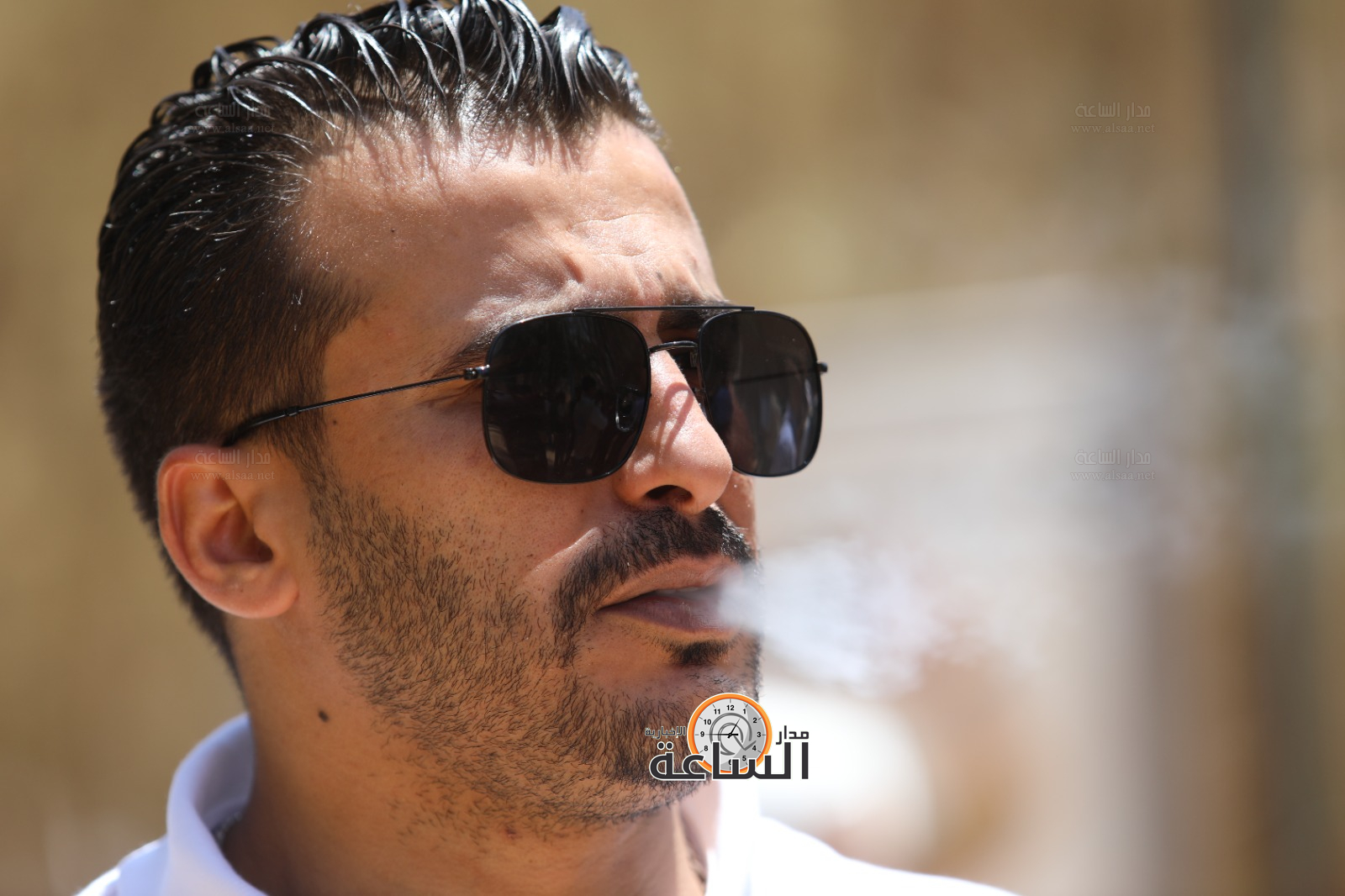 Madar Al-Saa Images 0.5732408798239266