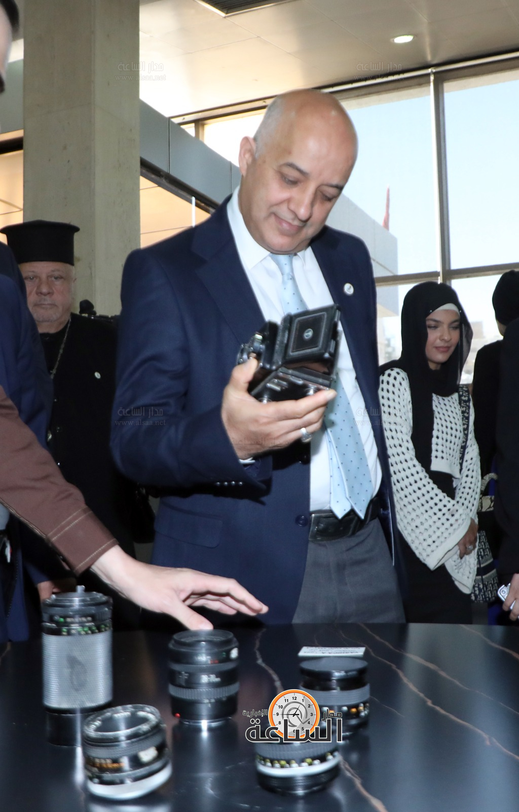 Madar Al-Saa Images 0.49970036365186177