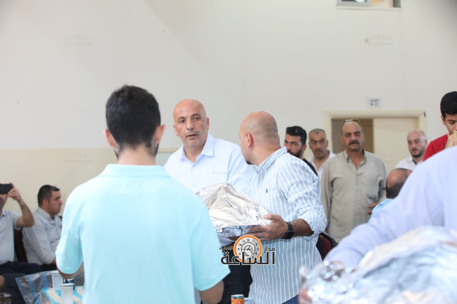 Madar Al-Saa Images 0.7357111523929147