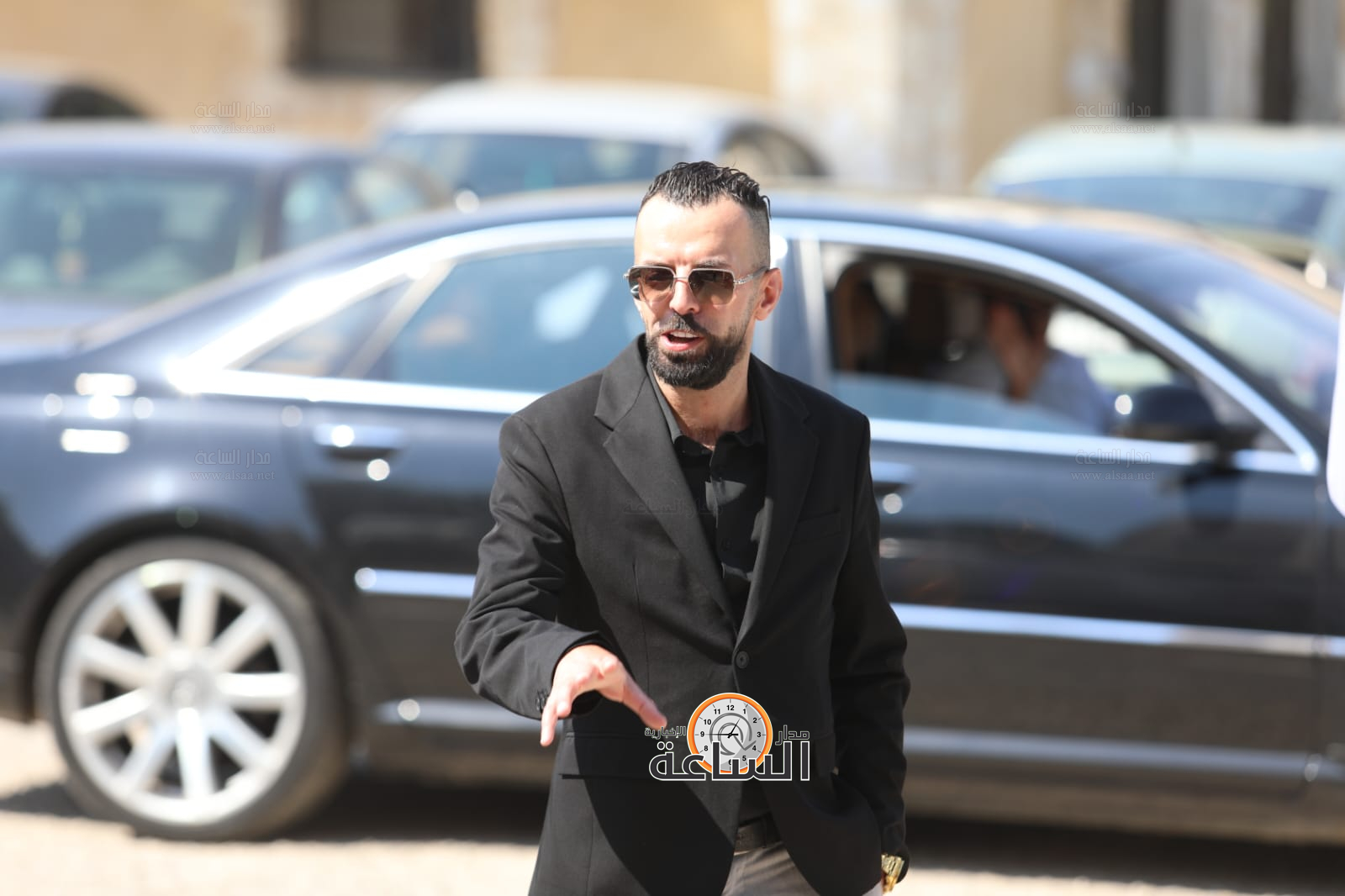 Madar Al-Saa Images 0.4838128653352405