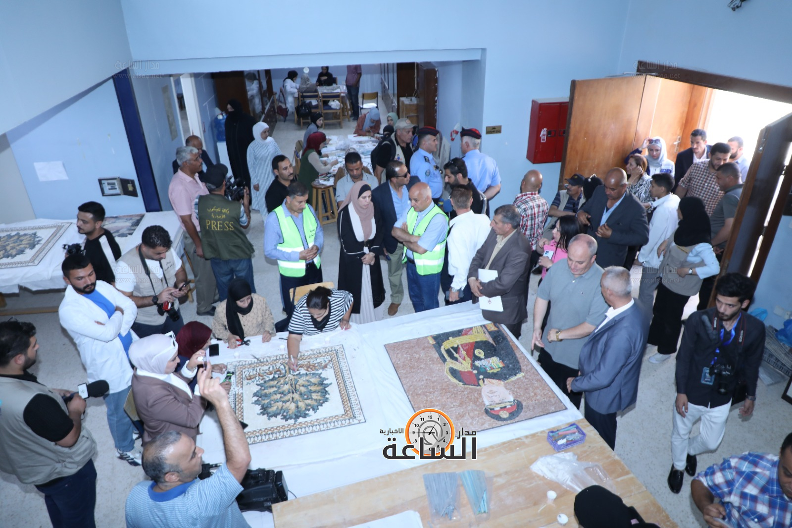 Madar Al-Saa Images 0.7658599089587981