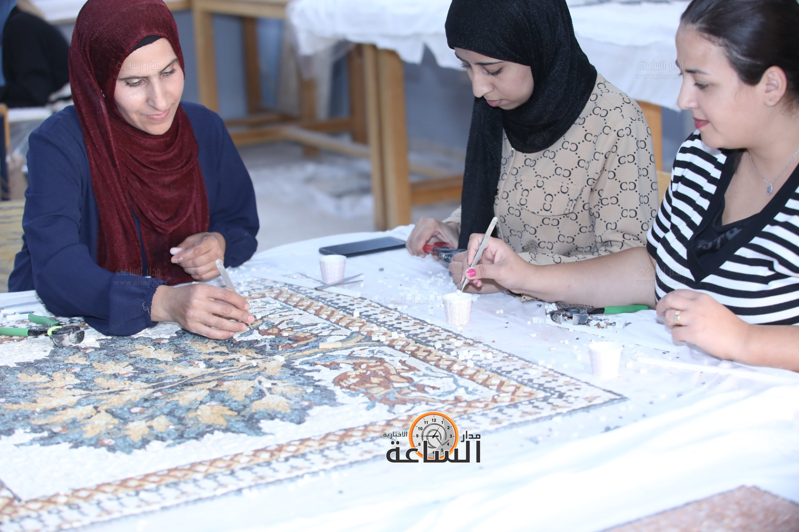 Madar Al-Saa Images 0.499057850705495