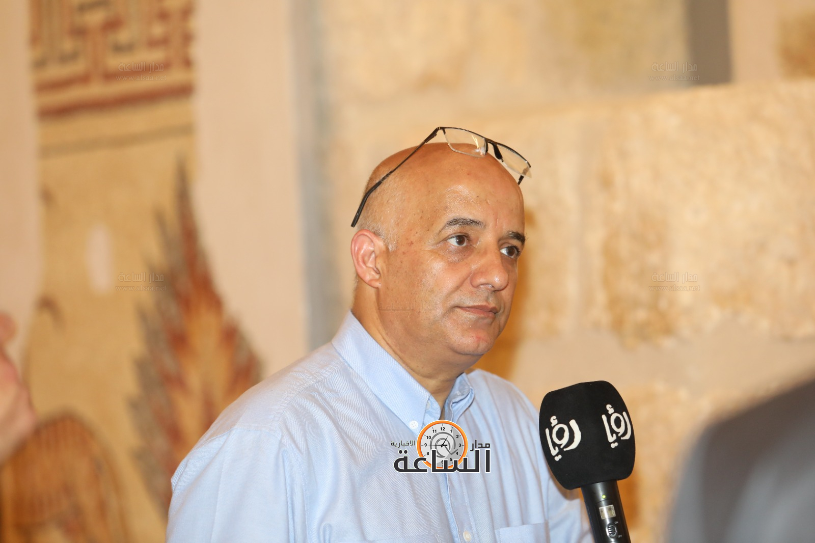 Madar Al-Saa Images 0.8412480386827113