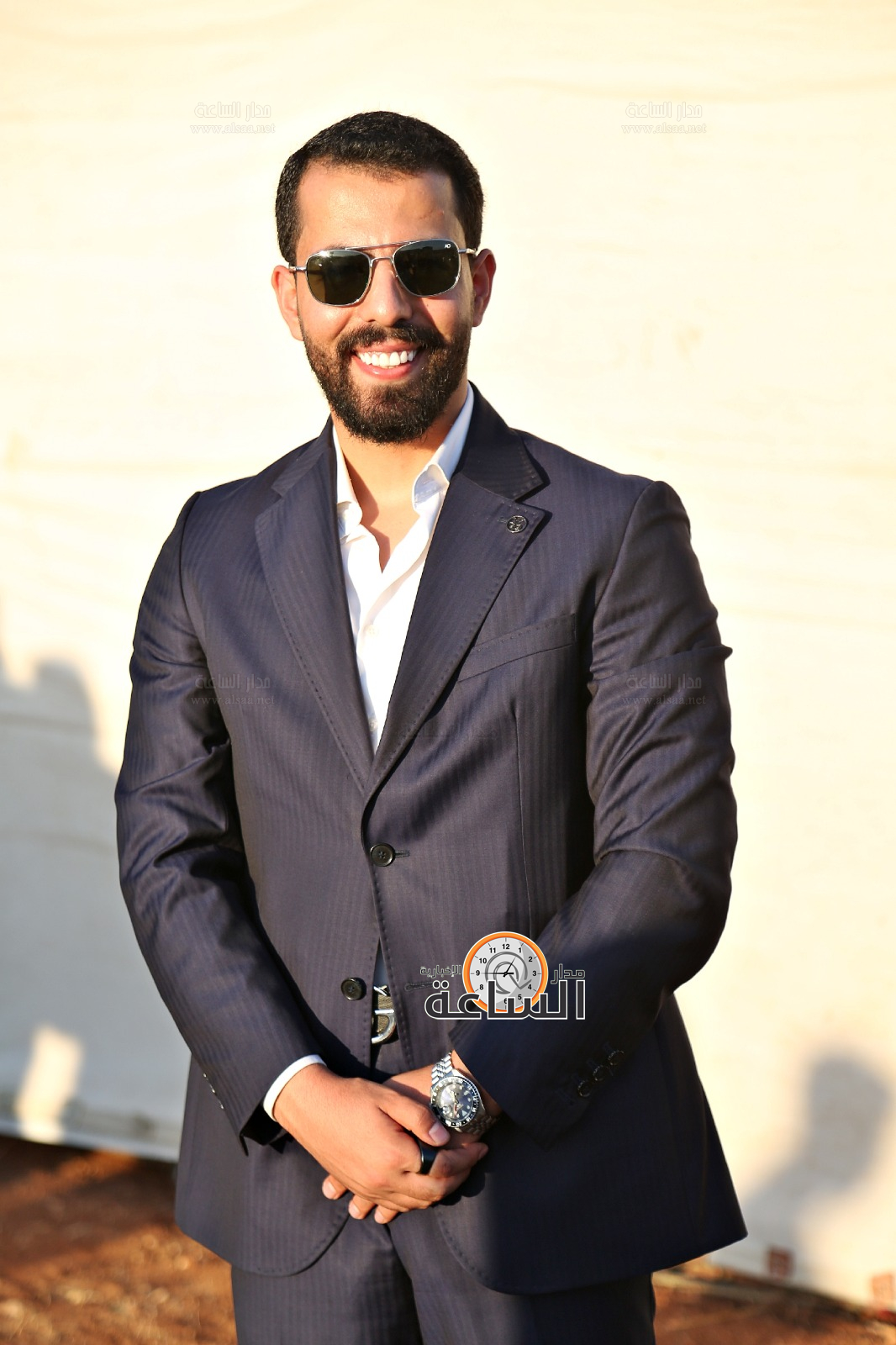 Madar Al-Saa Images 0.571946937241651