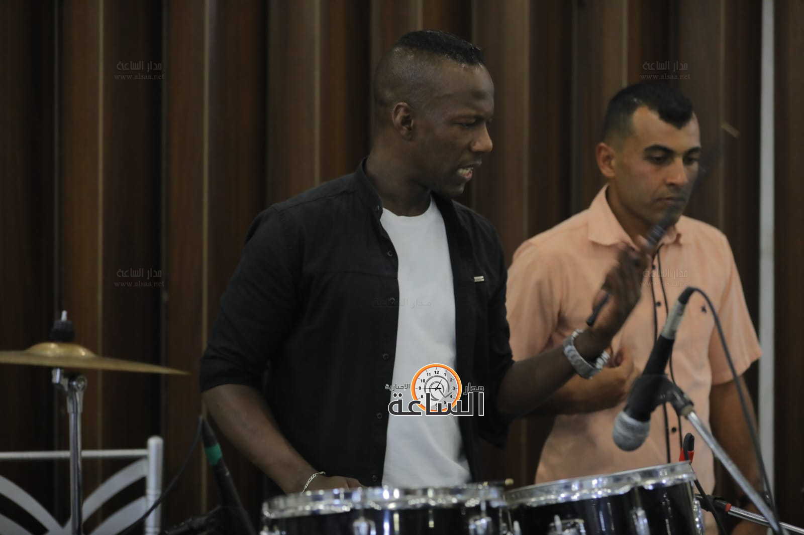 Madar Al-Saa Images 0.6856093345201977