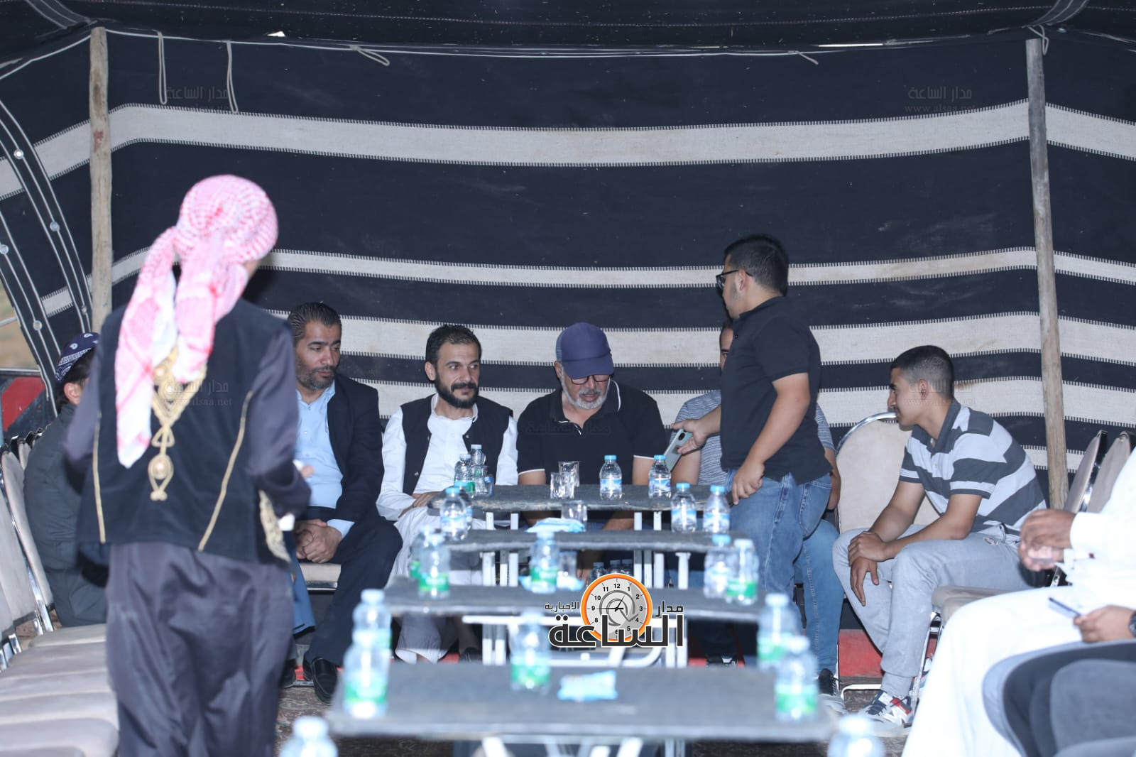 Madar Al-Saa Images 0.8382684430678096