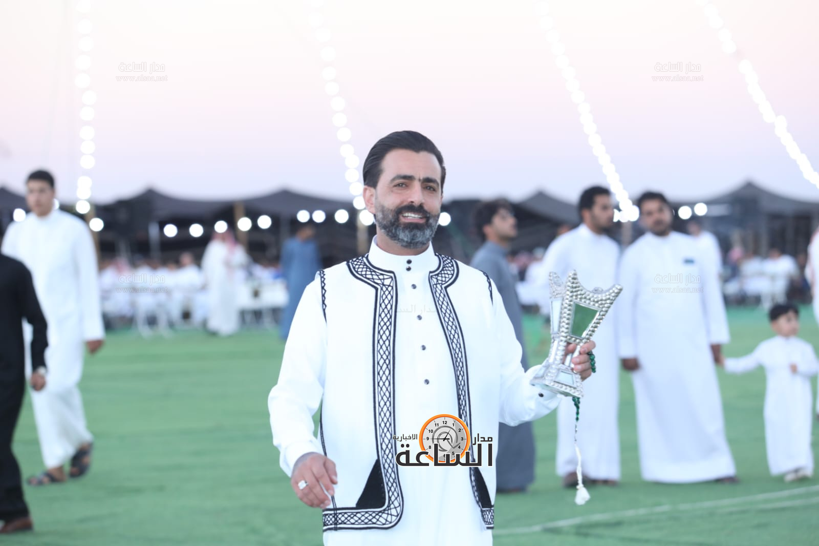 Madar Al-Saa Images 0.01157944372737818