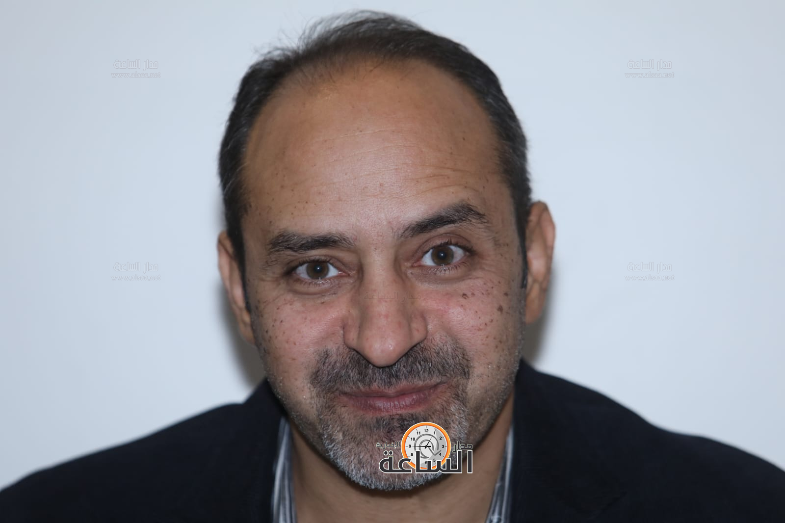 Madar Al-Saa Images 0.9301381169312175