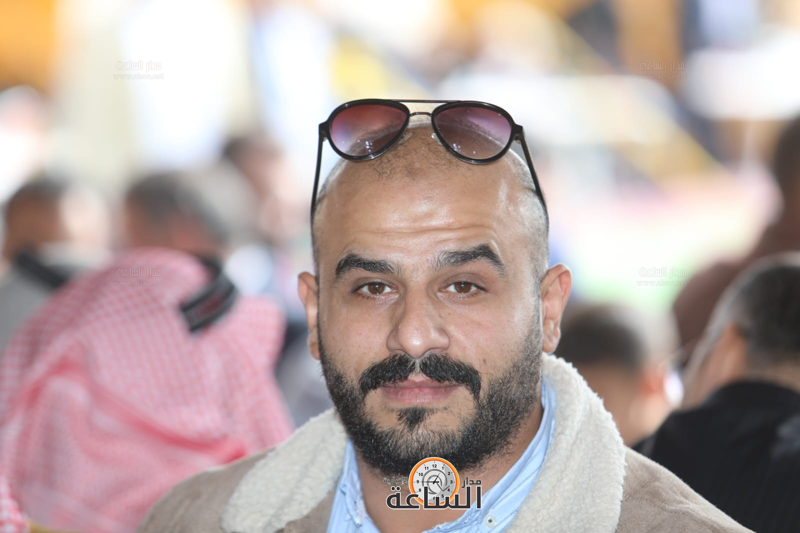 Madar Al-Saa Images 0.48491352719229286