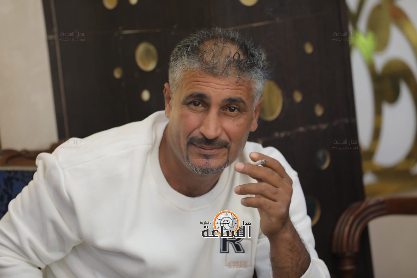 Madar Al-Saa Images 0.8773836795509409