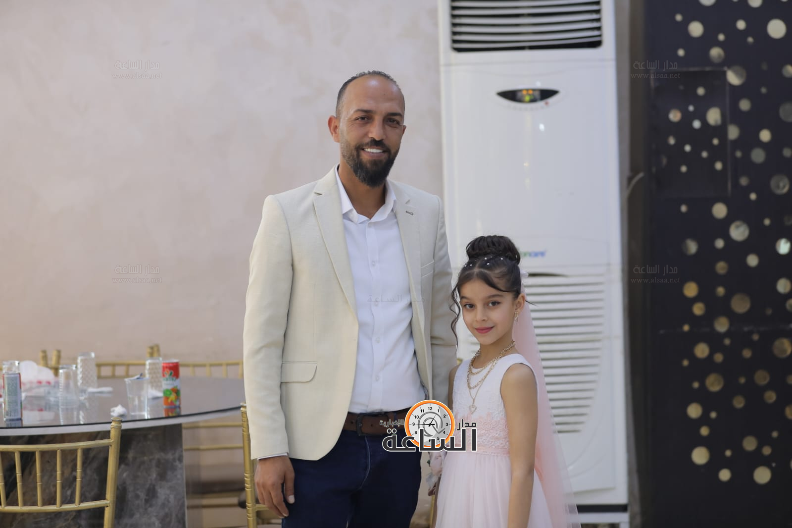 Madar Al-Saa Images 0.38306065694344427