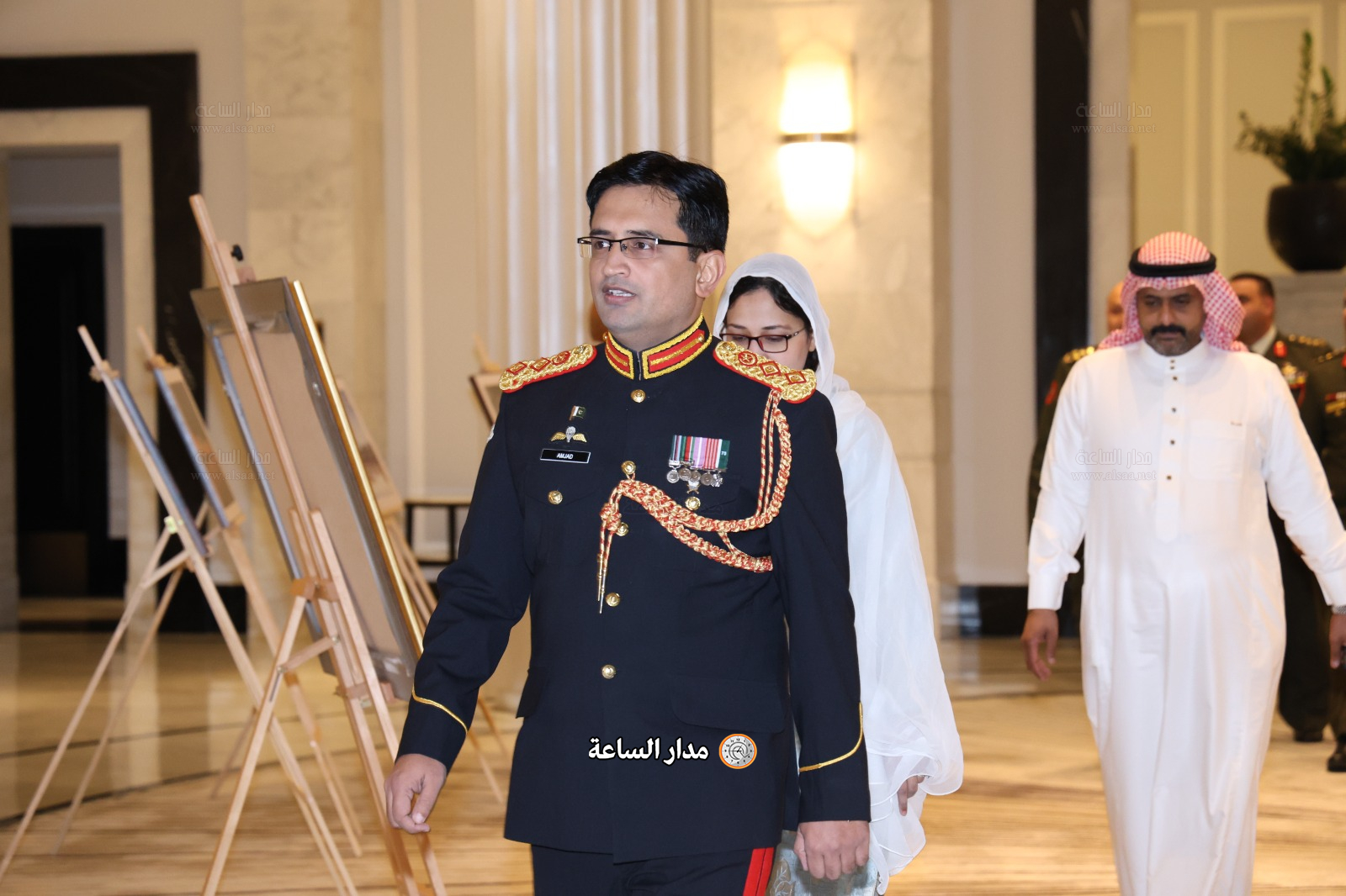 Madar Al-Saa Images 0.472956461685639