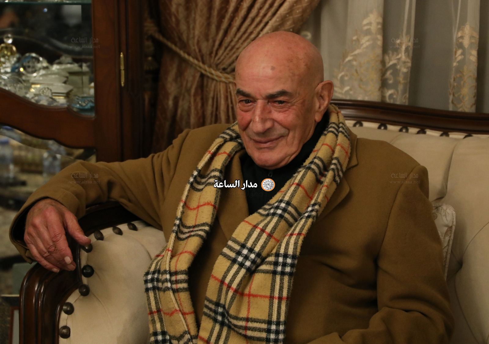 Madar Al-Saa Images 0.6740672345703269