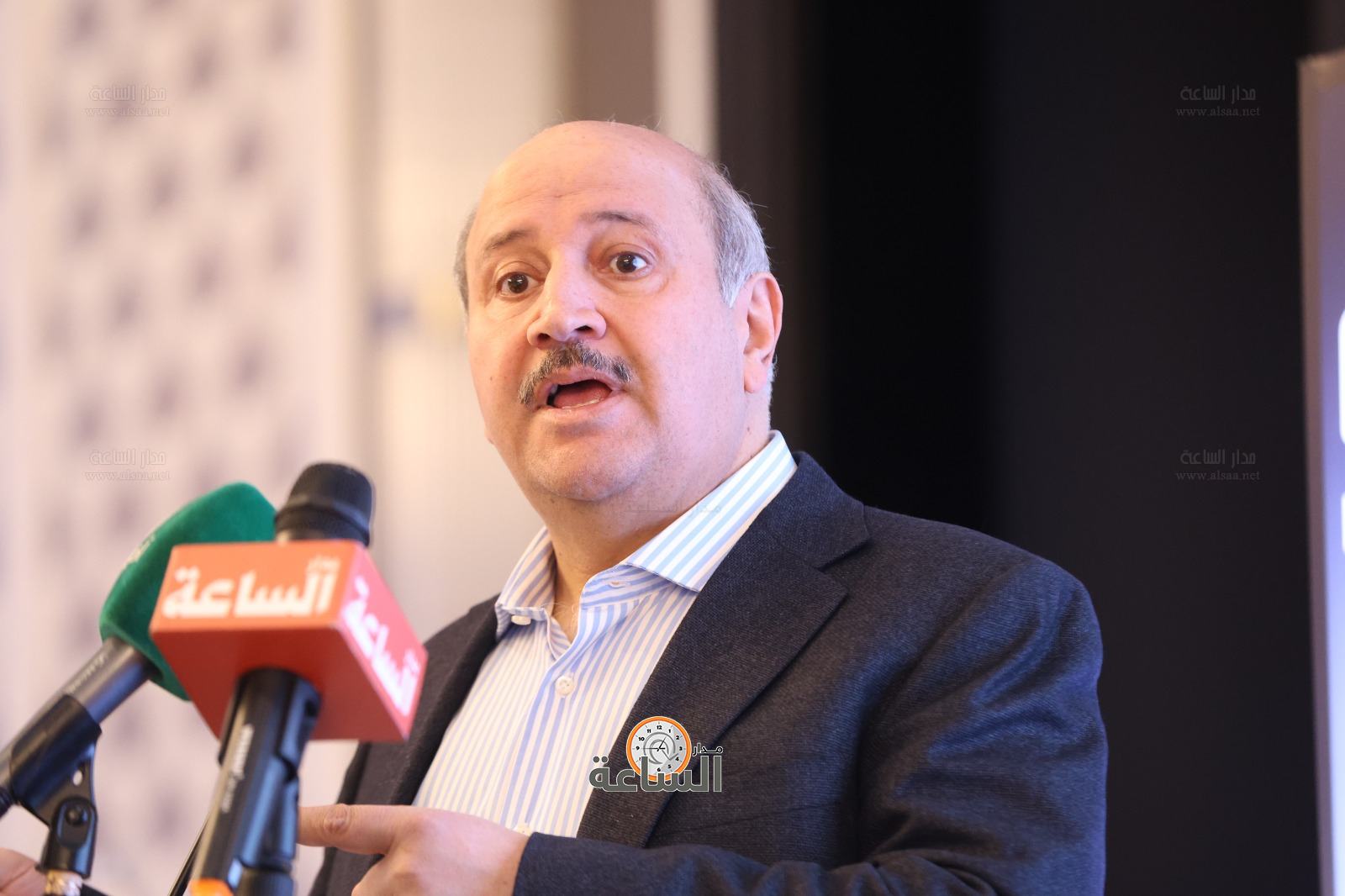 Madar Al-Saa Images 0.03124409348253465