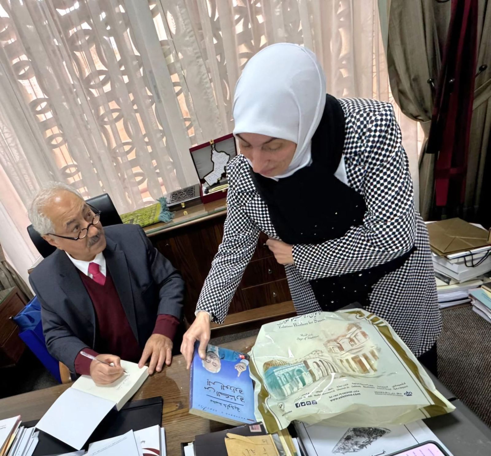 Madar Al-Saa Images 0.8115977654588686