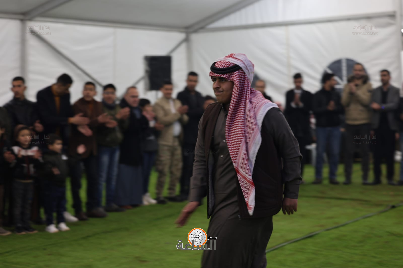 Madar Al-Saa Images 0.6944392775428982