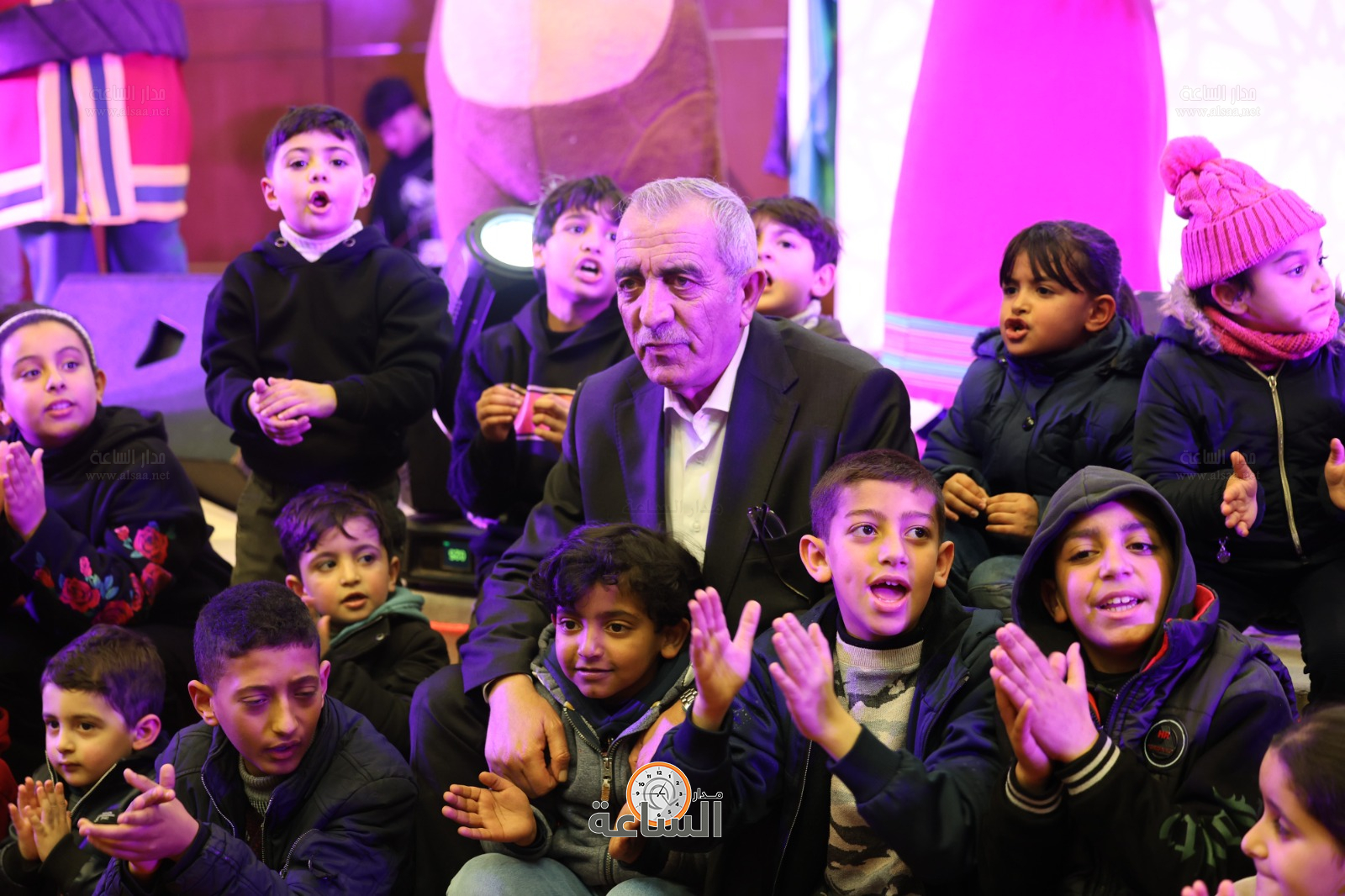 Madar Al-Saa Images 0.7856043888315578