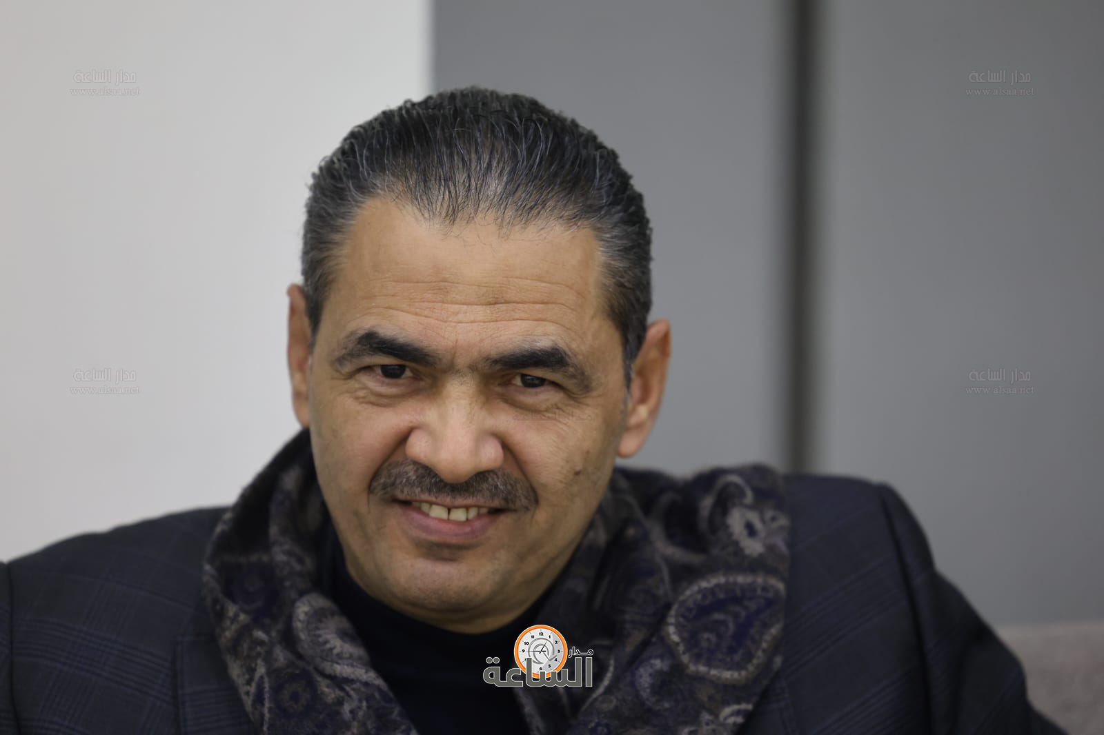 Madar Al-Saa Images 0.454235647429885