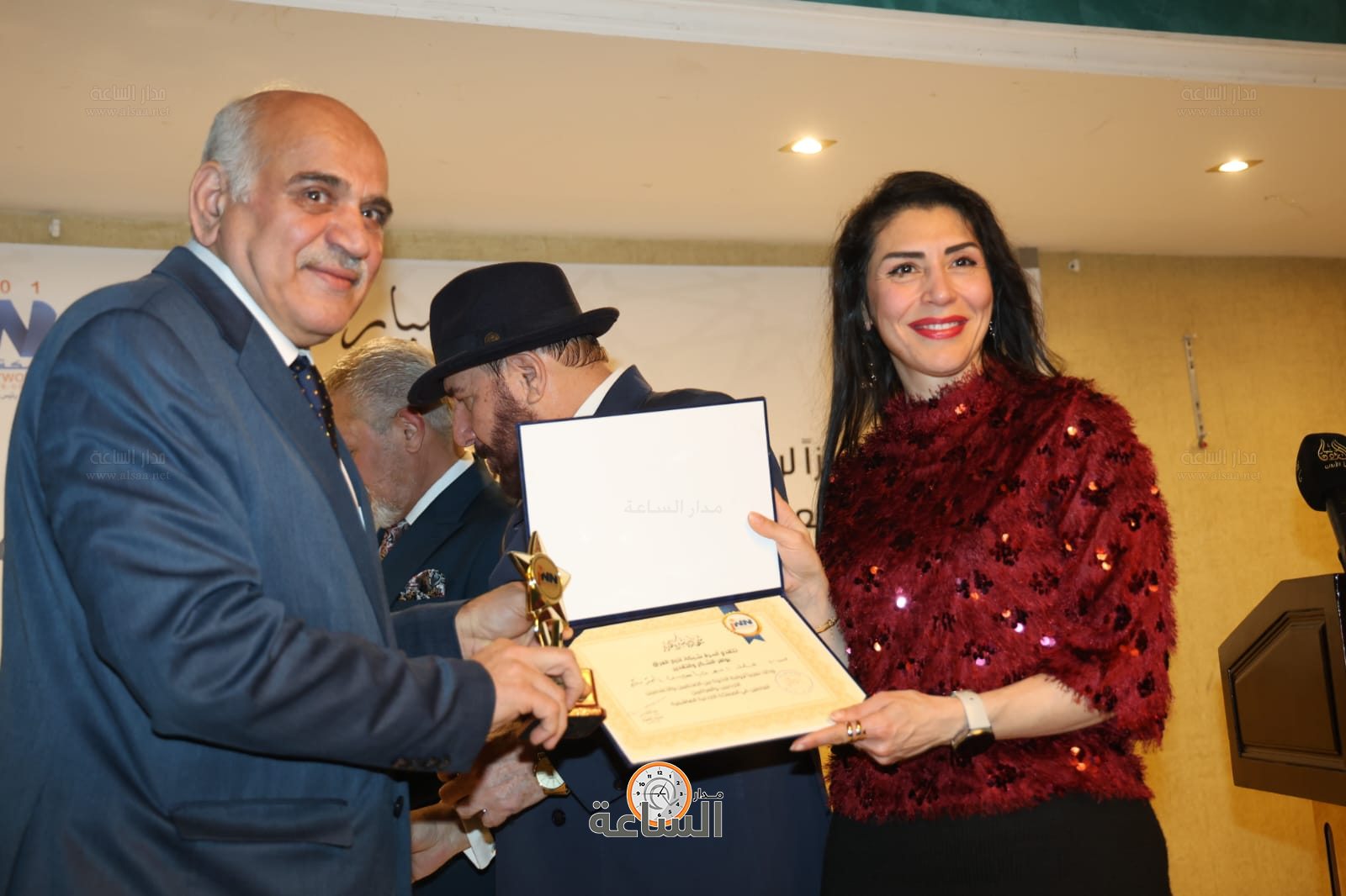 Madar Al-Saa Images 0.14630336803052657