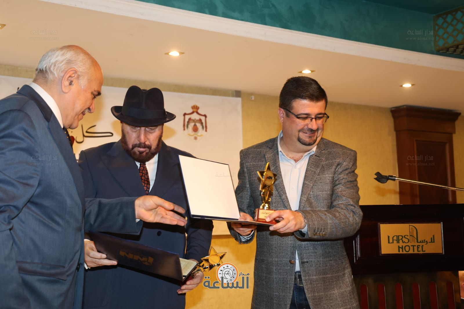 Madar Al-Saa Images 0.0030855763968586913