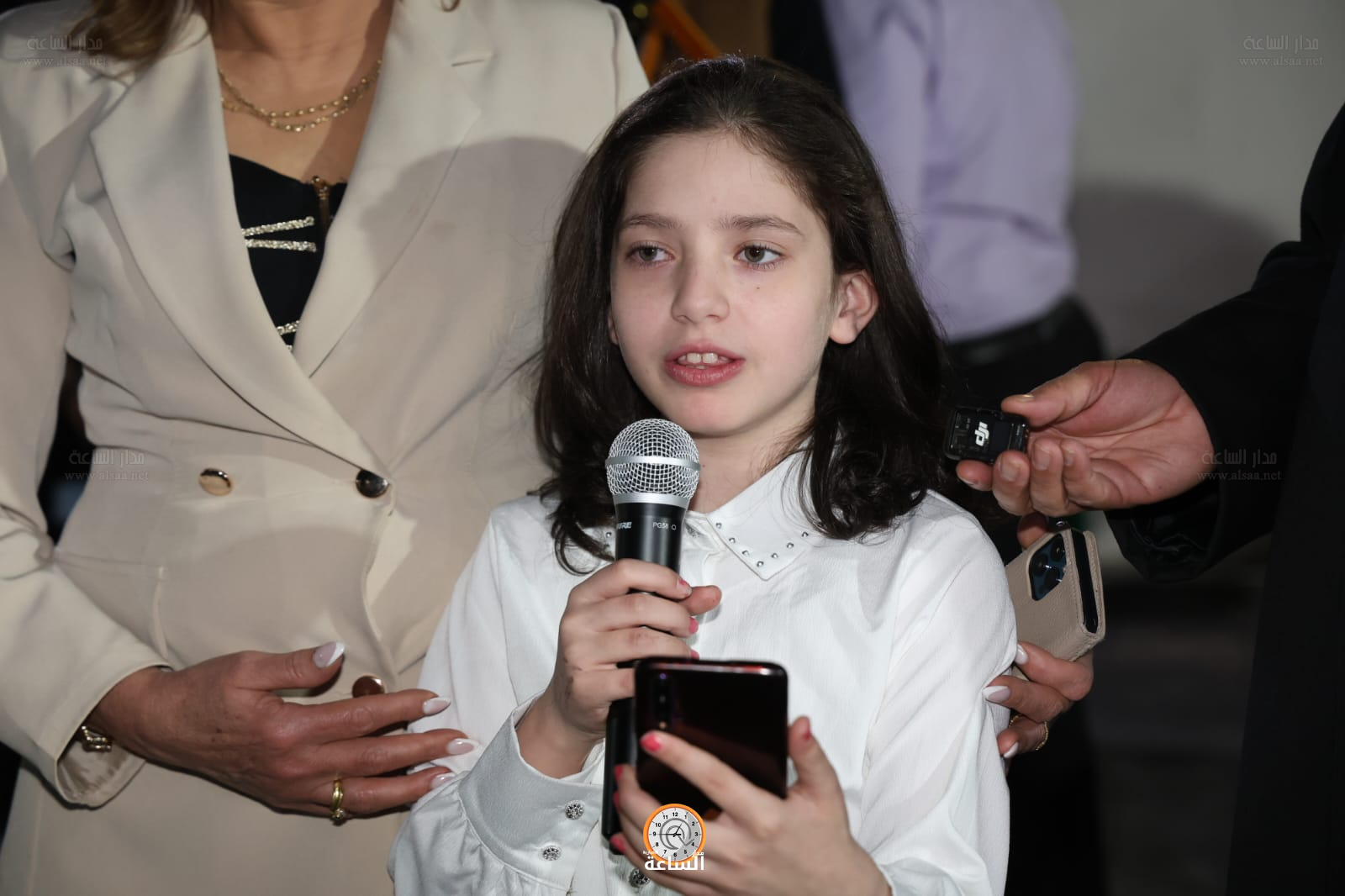 Madar Al-Saa Images 0.7612717137502469