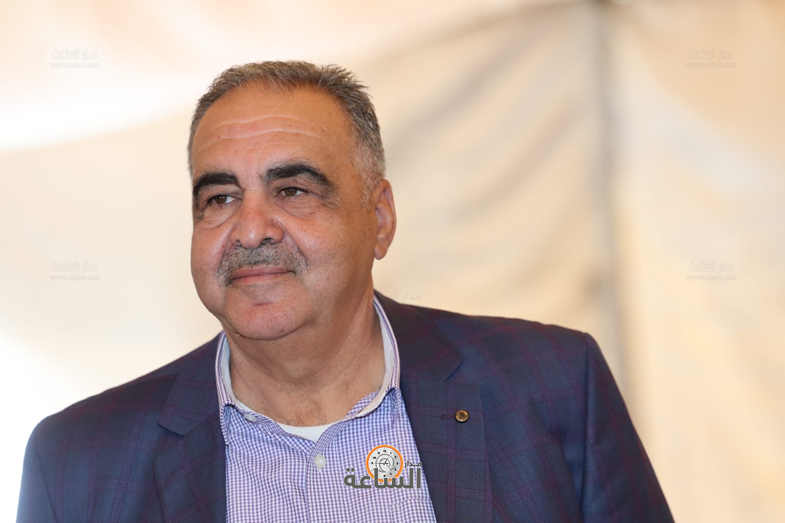 Madar Al-Saa Images 0.8940488345602189