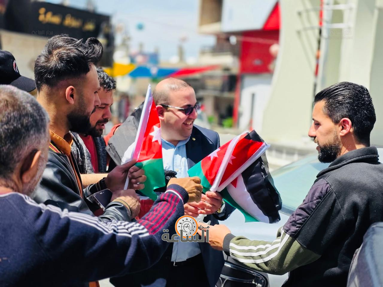 Madar Al-Saa Images 0.4417845606010318