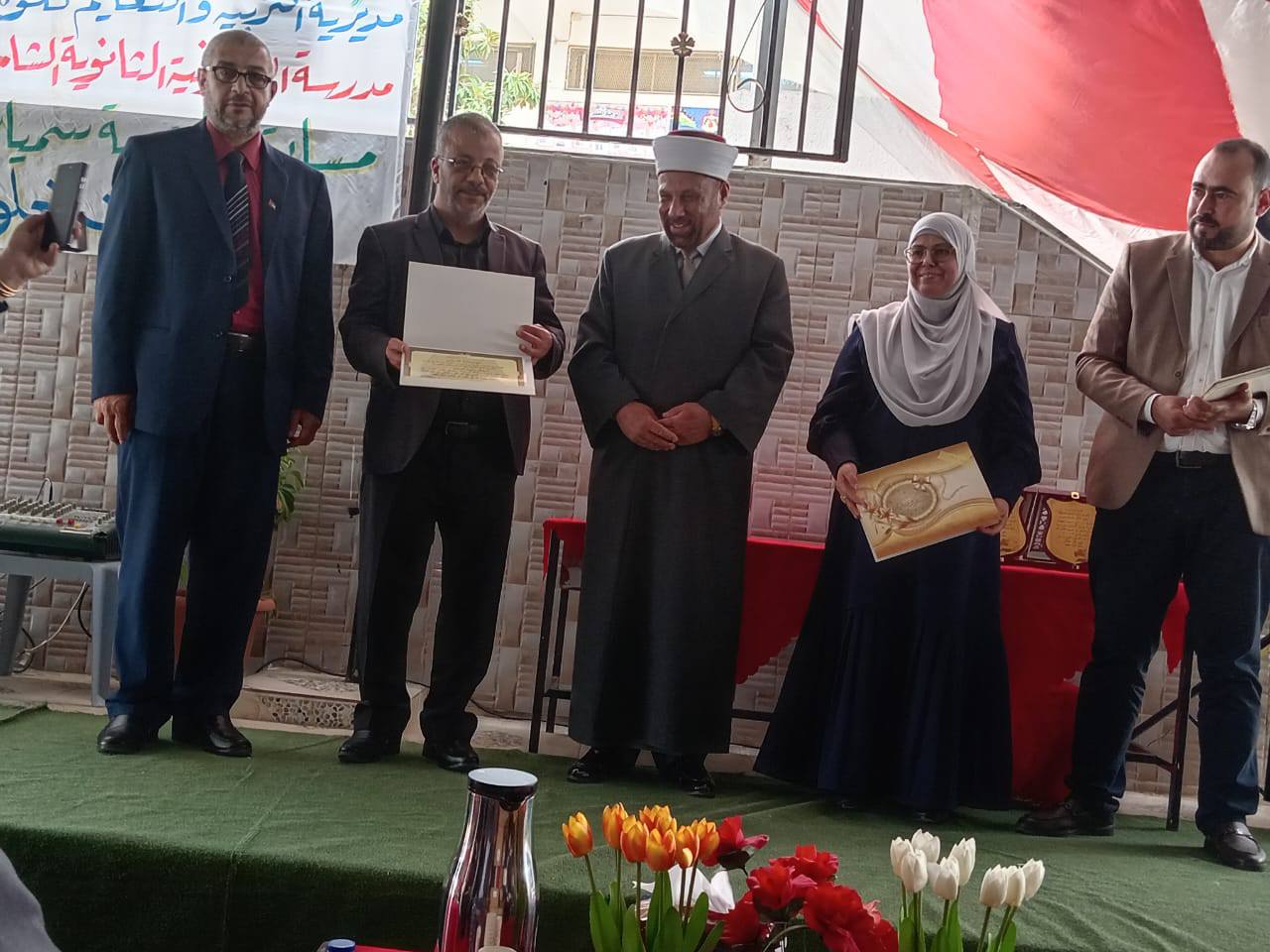 Madar Al-Saa Images 0.5572434660843208